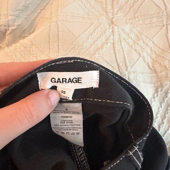 Black Garage Cargo Pants, with white stitching on the side. - Picture 3 of 4